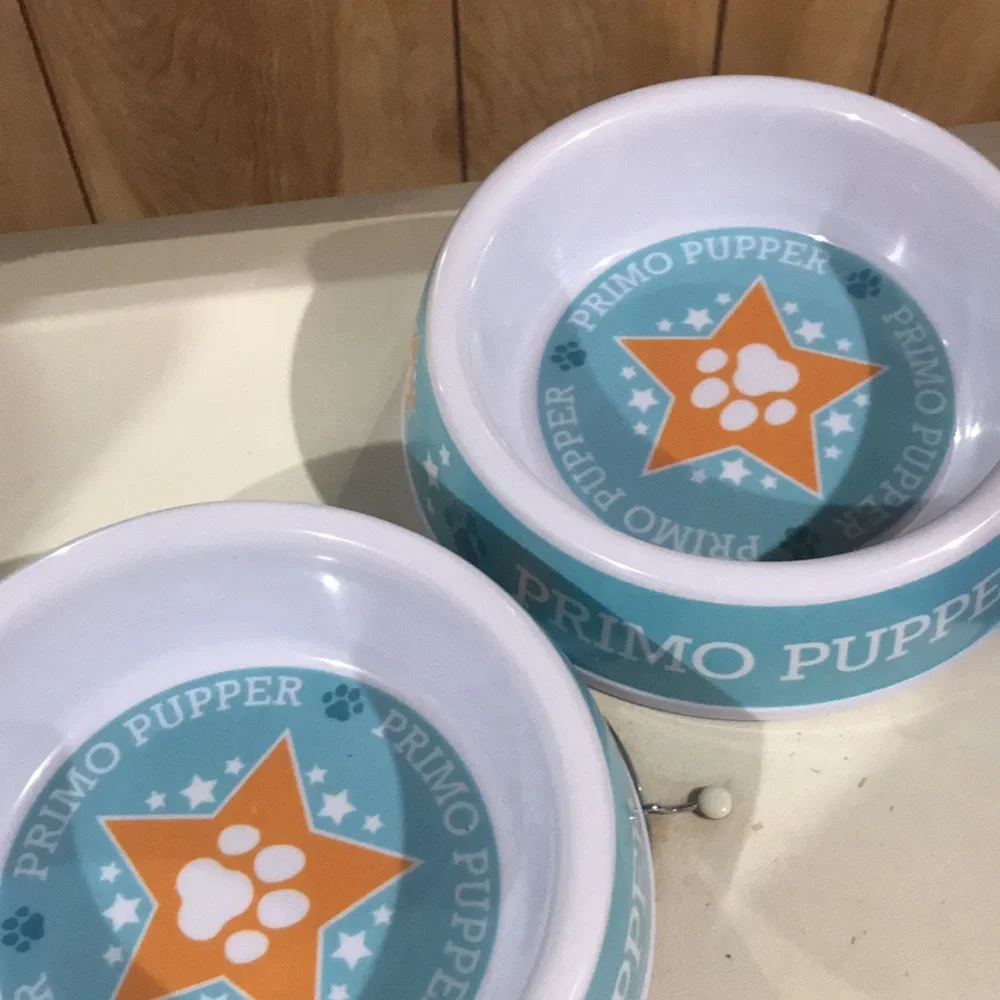 2 round dog bowls and one with 2 bowls.